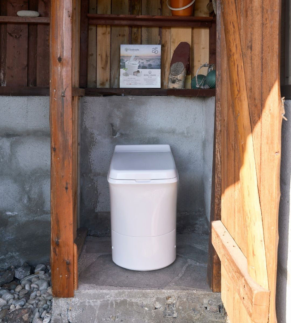 Cinderella Freedom incineration toilet installed in a small guest house toilet room.